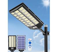 JAYNLT Luces solares de calle de 9500 W para exteriores, luces de estacionamiento de 6500 K más altas, resistentes al agua, lámparas solares de seguridad de inundación duks to dawn, sensor de