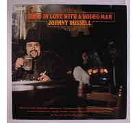 Johnny Russell - She's in love with a rodeo man / Vinyl record [Vinyl-LP]