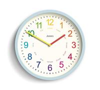 JONES CLOCKS® Kids Reloj de Pared | Pequeño Reloj Infantil Moderno | 25cm | Azul pálido | Esfera de Colores para Aprender a Decir la Hora