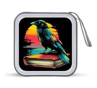 Jubonexis Estuche de almacenamiento portátil para CD o DVD, diseño de cuervo negro sentado en un libro grande para coche, casa, viajes