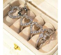 Juego de joyas de circonita cúbica con corazón hueco, aretes y anillo para mujer