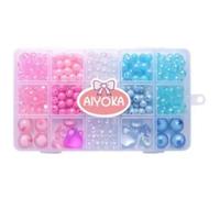 Juego de perlas en caja organizadora con compartimentos.