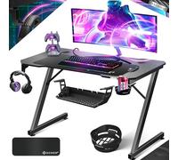 KESSER® Mesa Gaming | 120 x 60 cm | Escritorio para Gamer en Forma de Z | Soporte para Auriculares | Mesa ergonómica para Ordenador | In lfombrilla de ratón y Soporte
