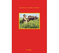 Kim Jong Il looking at things