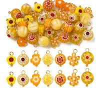 KitBeads Abalorio hecho a mano de Millefiori Lampwork con diseño de flor amarilla y roja para hacer joyas