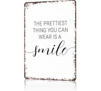 KWQDOZF Letreros metálicos vintage Lo más bonito que puedes llevar es una sonrisa Póster decorativo para garaje, oficina, bar, dormitorio, hogar y sala de estar (20 x 30 cm)