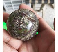 La bola de piedra de sangre de dragón juega con la bola y gira la bola de agua de viento