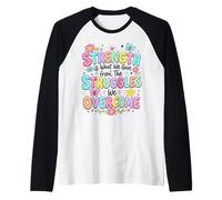 La Fuerza es lo Que ganamos de Las luchas Que superamos Camiseta Manga Raglan