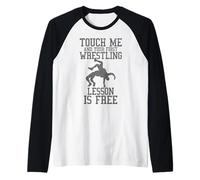 La primera lección de lucha libre es gratis divertido luchador Camiseta Manga Raglan