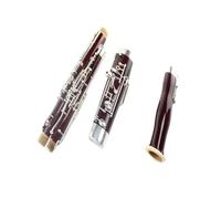 La superficie del oboe bajo en C está plateada. Tocando Clarinete