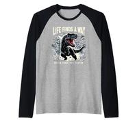 La vida encuentra un camino, la muerte te encuentra más rápido, juego de palabras con dinosaurios T-Rex Camiseta Manga Raglan