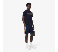 LACOSTE Pantalón corto de tenis ligero con diseño color-block. Color azul marino