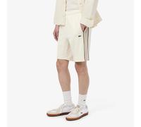 LACOSTE Pantalón corto regular fit de forro polar con diseño color-block. Color beige