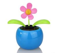 Las alegres flores bailarinas alimentadas por energía solar añaden un toque de capricho a la decoración de tu hogar (azul)