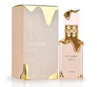 Lattafa- Eclaire EDP Spray 100ML De Lattafa La fragancia se abre con notas altas de caramelo, leche y azúcar que cautivan los sentidos con su dulzura rica y cremosa, que recuerda a un dulce decadente.