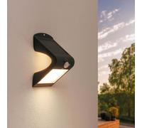 Ledvion aplique solar LED con sensor negro 1,5W blanco cálido IP65 | Luz ambiental sin cables para fachada, valla, entrada y terraza