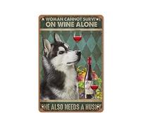 Letrero de metal con texto en inglés "A Woman Cannot Survive On Wine Alone She Also Needs A Husky" (Una mujer no puede sobrevivir solo en el vino solo ella también necesita un husky)