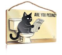 Letrero de puerta con texto en inglés "Work From Home" con texto en inglés "A Cat Sitting On A Toilet Reading A Newspaper Wooded Sign"