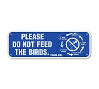 Letreros de hojalata con texto en inglés "Please Do Not Feed The Birds" (texto en inglés «Please Do Not Feed The Birds»)