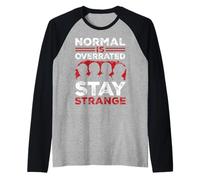 Lo Normal está sobrevalorado. Mantente extraño Camiseta Manga Raglan