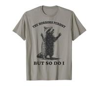 Los horrores persisten pero yo también mapache Meme Hombres divertidos Mujeres Camiseta