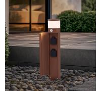 Lucande Lámpara sobremuro Corban, óxido, sensor, enchufes, IP44