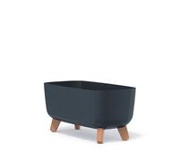 Maceta rectangular Gracia Case en las piernas