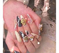 Manicura que realza el temperamento, manicura personalizada a mano con acabado de ángel que lleva un parche de uñas postizas.(L)