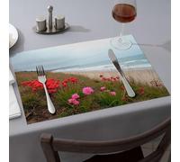 Manteles individuales rosas con diseño de flores en un acantilado con vistas al océano. Manteles individuales lavables para decoración de fiesta occidental (4 piezas)