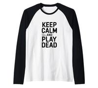 Mantén la Calma y hazte el Muerto: Humor Divertido para Jugadores Camiseta Manga Raglan