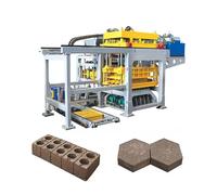 Máquina manual portátil para hacer ladrillos para construir bloques de hormigón a distancia con herramienta de fácil configuración para hacer agujeros