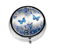 Mariposas azules y flores blancas. Este pastillero de viaje pequeño, redondo y de tres compartimentos es perfecto para almacenar medicamentos diarios, vitaminas y sobre la marcha.