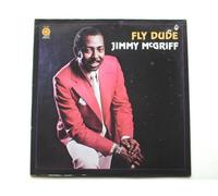 McGriff, Jimmy - McGriff, Jimmy Fly Dude LP Groove Merchant GM509 EX/EX 1974 sleeve has two drill holes at top right corner (to mark it for export)