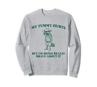 Me duele la barriga pero estoy siendo muy valiente mapache vaquero Sudadera