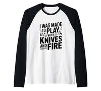 Me hicieron Jugar con Cuchillos y Fuego Camiseta Manga Raglan