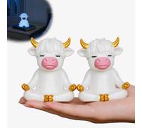 MENNTY Highland Cow Glow in the Dark - Tapas decorativas para pernos de inodoro para parte inferior del inodoro, bonita decoración de baño de vaca meditadora, color blanco con brillo azul