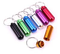 Mini pastilleros portátiles de 7 piezas Botella de pastillas de aleación de aluminio a prueba de agua 7 colores en 7 días Soporte para pastillas Llavero Recipiente para pastillas