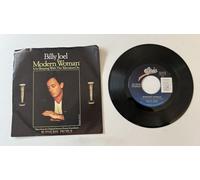 Modern Woman / Sleeping With The Television On [Vinilo]