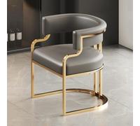 Moderno sillón tapizado de cuero elegante para sala de estar, comedor o recepción, patas de metal dorado, diseño elegante y cómodo