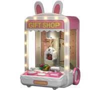 Monetais Mini máquina de Garras Máquina de Garras para niños con Sonidos y música Ajustables con Mini Juguetes de Peluche y cápsulas Venta de Juegos Cumpleaños para niñas Estilo 2, para niños