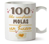 MUGFFINS Tazas 100 Cumpleaños - En Español - Feliz Cumpleaños Molas un Huevo - 11 oz / 330 ml - Regalo original y divertido