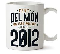 MUGFFINS Tazas 2012 Cumpleaños - En Catalán - Fent del Món un Lloc Millor - 11 oz / 330 ml - Regalo original y divertido