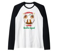 Navidad en el Horizonte de Dubai Palmeras y Ambiente Festivo en el Desierto Camiseta Manga Raglan