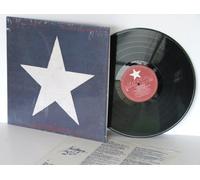 NEIL YOUNG Hawks and Doves In shrink but opened with tax cut on spine. With inner lyric sleeve.Top copy. US pressing. 1986.