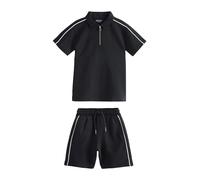 NEXT Niños Conjunto de polo con cuello con cremallera y pantalones cortos Negro 14 Años