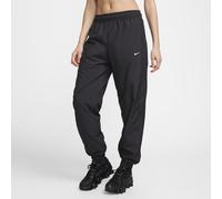 Nike Classic Wovens Jogger de ajuste holgado y talle medio con protección UV - Mujer - Negro S (EU 36-38)