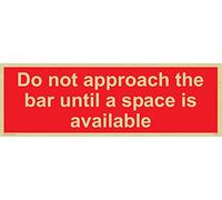 No se acerque a la barra hasta que haya un espacio disponible