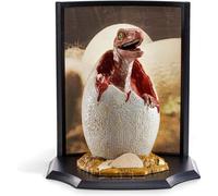 Noble Collection Jurassic Park Huevo con Velociraptor Bebé