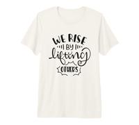 Nos levantamos levantando a los demás la bondad inspiradora Camiseta Premium