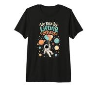 Nos levantamos levantando a Otros Astronauta Inspiración Trabajo en Equipo Camiseta Premium